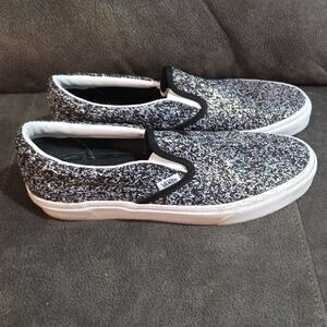 Vans Black and White Slip-On Sneakers